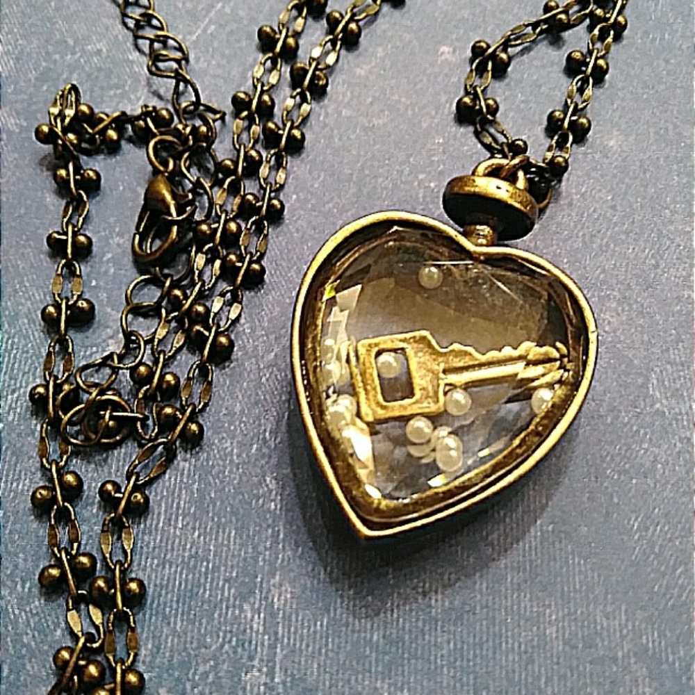 Pretty bronze floating heart pendant